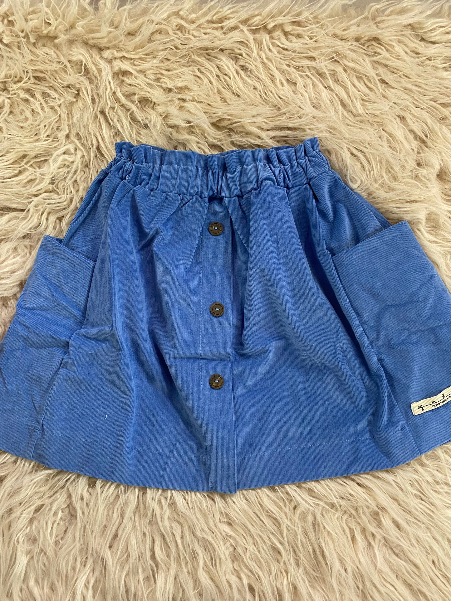 Gonna in velluto a costina colore azzurro