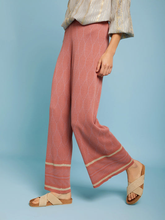 Pantaloni in maglia colore rosa lampone stampata